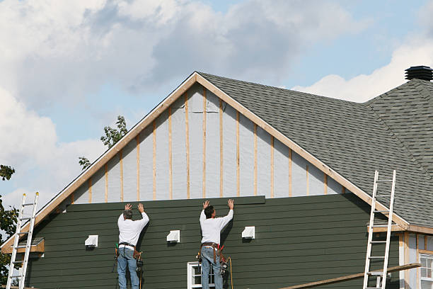 Professional Emergency Siding Repair technician working in Blaine, TN